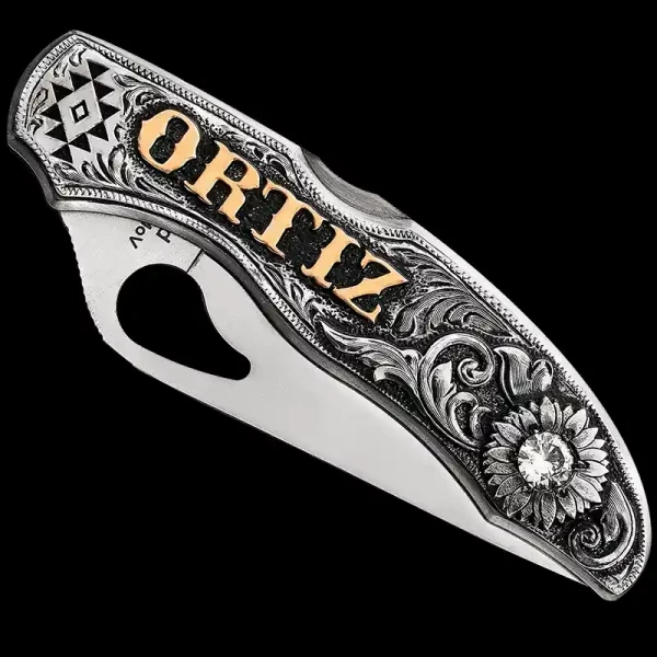 Our hand-engraved Endless Horizon Custom Knife is the perfect tool for any occasion. This custom-made piece is crafted using a Spyderco Byrd knife and a German Silver plate. The plate is hand-engraved and finished with our signature antique finish, featur